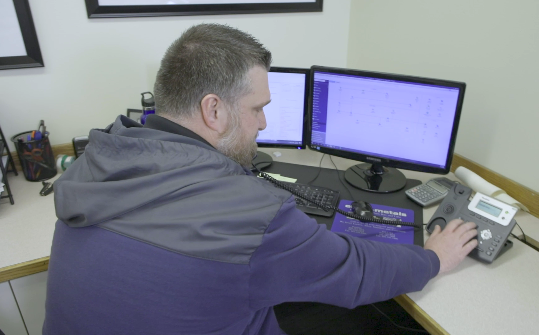 A TechTAC team member on the phone